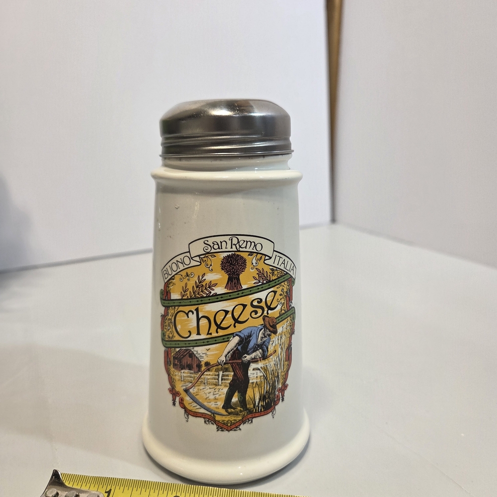mark. White Ceramic Cheese Shaker with Yellow & Green Vintage Graphic